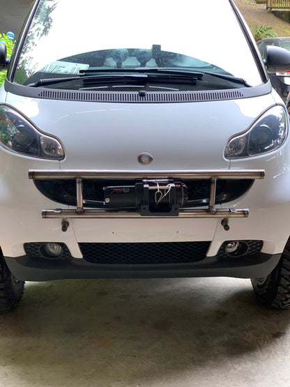 Tubular front bumper installed on a white Smart Fortwo 451, front view