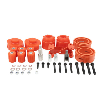 Vehicle suspension lift kit with red spacers, bolts, washers, and mounting hardware